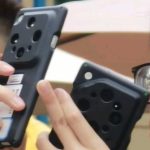 Imagem de dois jovens a tirar fotos com smartphones Oppo Find X9, destacando a grande câmara traseira do dispositivo.